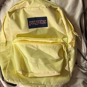 JanSport Classic Yellow Backpack three pockets